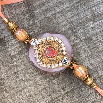 Exclusive OM Design Rakhi with Gold & Diamond Work