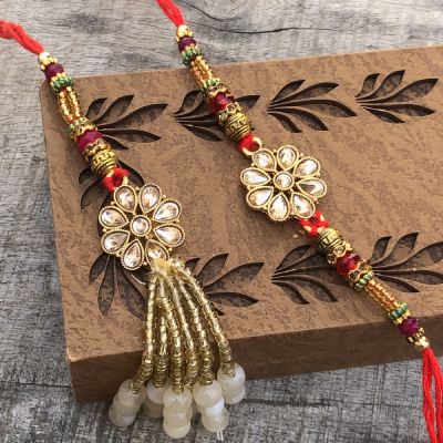 Auspicious Jewellery Style Bhaiya Bhabhi Rakhi Set