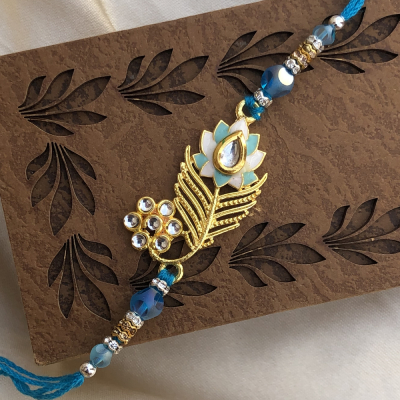 Vivacious Gold Work Flower Blue Rakhi for Raksha Bandhan