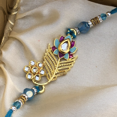 Extravagent Gold & Stone Work Blue Rakhi for Brother