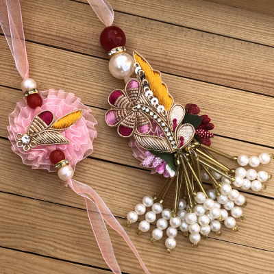 Appealing Pink Flower Bhaiya Bhabhi Rakhi Set