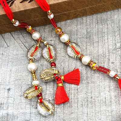 Eye Catching Glass & Gold Bhaiya Bhabhi Rakhi for Raksha Bandhan