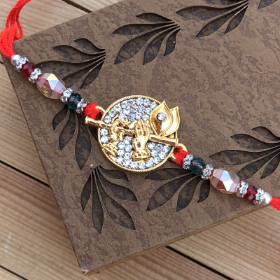 Auspicious Krishna Flute Diamond Rakhi for Brother