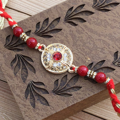 Enticing Royal Red Stone & Diamond Gold Rakhi