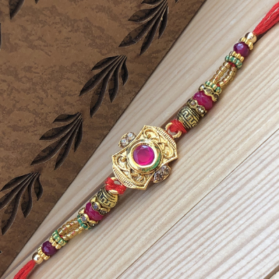 Flawless Meena Stone & Diamond Gold Rakhi for Raksha Bandhan