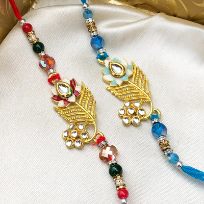 Elegant Red & Blue Gold Polished Flower Rakhi Set of 2