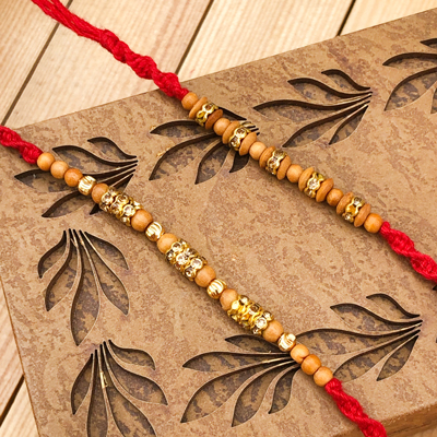 Dazzling Precious Stone & Beads Rakhi Set of 2