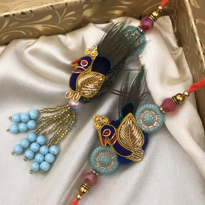 Mesmerizing Peacock Rakhi Set for Bhaiya Bhabhi