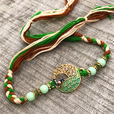 Rare Green Beads & Peacock Gold Rakhi for Brother