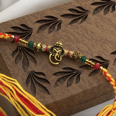 extravagant Beads & Lord Ganesh Rakhi for Brother