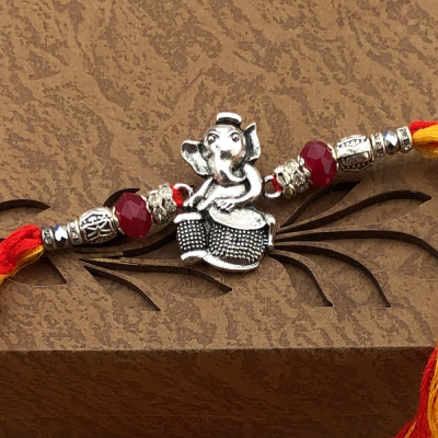 Wonderful Bal Ganesh Silver Rakhi Set for Little Brother