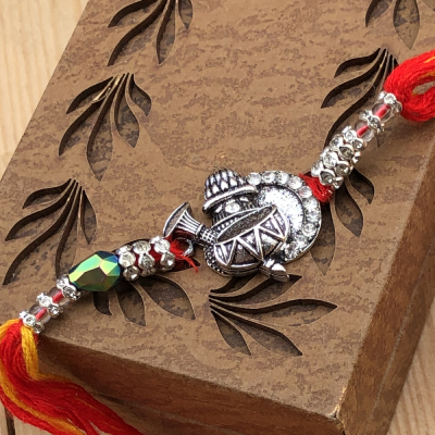 Alluring Diamond & Silver Rakhi for Young Brother