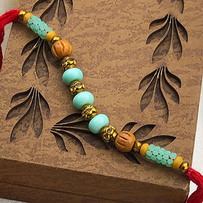 Alluring Beads & Green Pearl Brother Rakhi Set