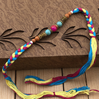 Enthralling Multicolor Pearl Rakhi Set for Bhaiya