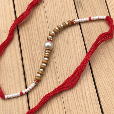 Admirable Beads & Pearl Rakhi Set for Brother