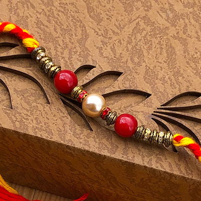 Astonishing Red-Golden Pearl Bhaiya Rakhi Set