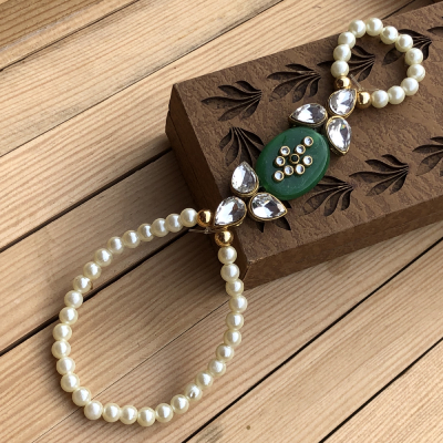 Captivating Green Stone Lumba Rakhi Set for Bhabhi