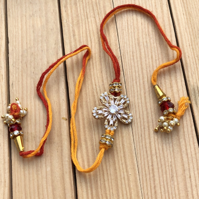 Ad Precious Comfortable Gold Rakhi for Brother