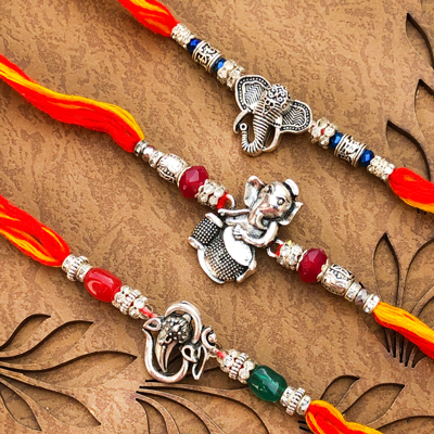 Fascinating Silver Motif Set of 3 Rakhi for Brothers