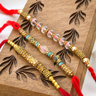 Exuberant Gold & Glass 3 Rakhi Set for Brothers