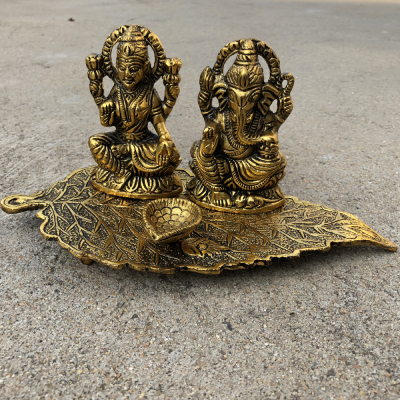 Auspicious Metal Laxmi Ganesh Idol Showpiece with Oil Lamp Diya for Rakhi Gift