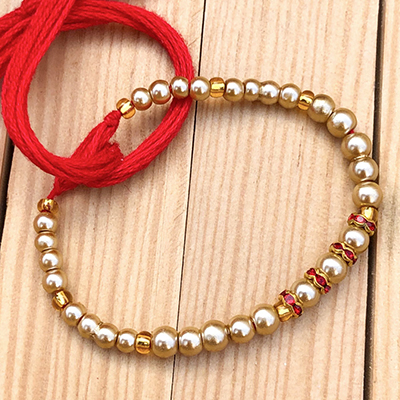 Admirable Gold Plated Pearls Brother Rakhi