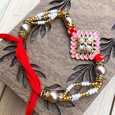 Exclusive Pink Kundan Stone along with Pearls Rakhi for Bhaiya