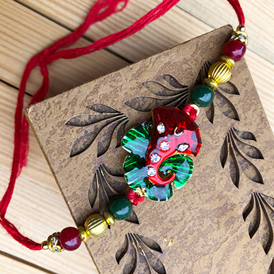 Lucky Lord Ganesha Red-Green Stone Rakhi for Brother