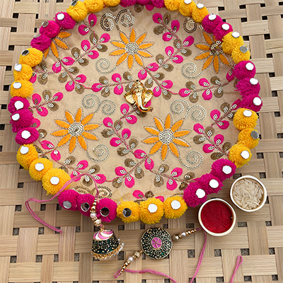 Authentic Ari Tari based PomPom puja thali with Rakhi combo for bhaiya bhabhi