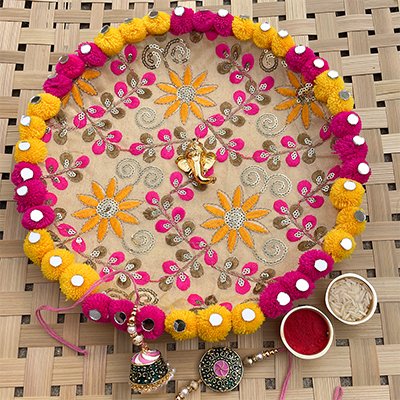 Authentic Ari Tari based PomPom puja thali with Rakhi combo for bhaiya bhabhi