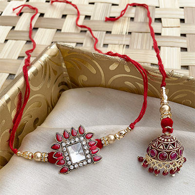 Auspicious mirror design Red and white stone touch Bhaiya-bhabhi Rakhi set