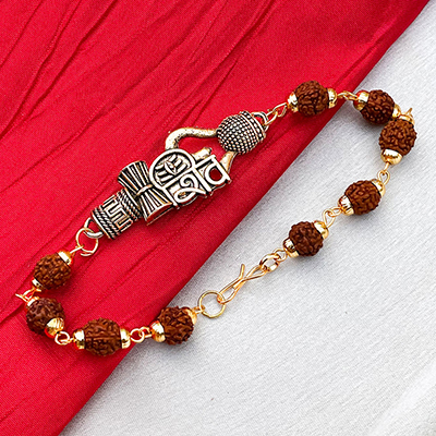 Traditional Rudraksh based gold plated shiva symbol bracelet rakhi for brother