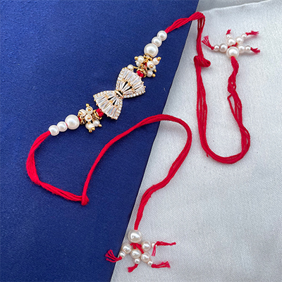 Butterfly shape AD designer pearls red dora bhaiya Rakhi.