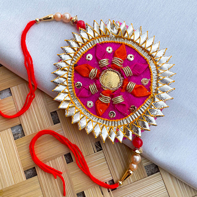 Tari work purple circle shape base fabric handmade gota patti rakhi for Bhaiya